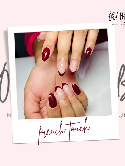 A classic French manicure with a rich, deep red tip. This elegant and bold design is perfect for those who love a timeless look with a touch of drama.