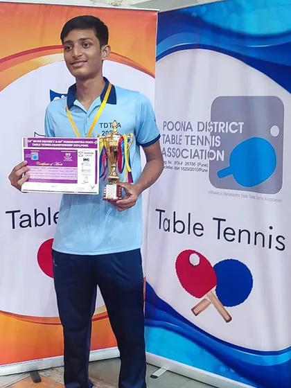 Johan Cheriparambil poses with his silver medal trophy and certificate at the Maharashtra State Championship in Pune.