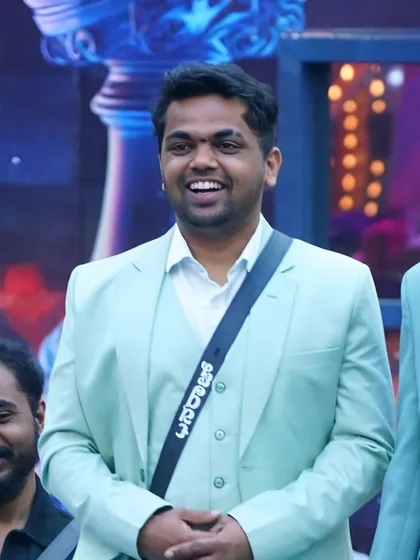 I also design custom ethnic wear for men. Here is a stylish mint green suit I created for Dhanraj Achar of Bigg Boss Kannada fame. It’s a modern take on formal wear, perfect for receptions or special events.
