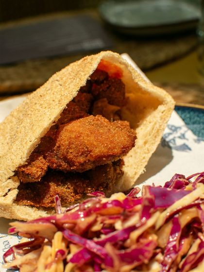 Another take on the stuffed poee, this one filled with a golden chicken cutlet. It showcases the versatility of this humble Goan bread.