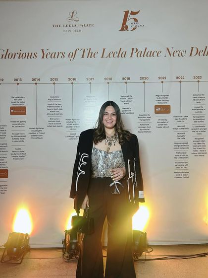 At The Leela Palace's 15th anniversary celebration. I styled a statement blazer over a corset and wide leg pants for a powerful and chic event look.