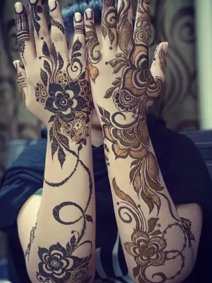 A dramatic and modern floral vine design that twists up both arms, creating a beautiful and eye-catching look.