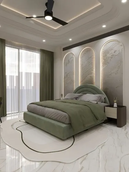 A bedroom should be a cozy sanctuary. For this space, I used a soft, pastel color palette, arched wall panels with subtle backlighting, and a unique area rug to create a room that feels both dreamy and deeply personal.