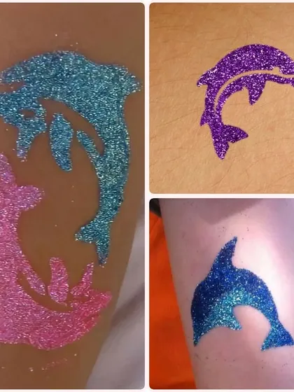 A collage of dolphin tattoos in various colors and styles. This is a very popular choice for kids who love sea animals.