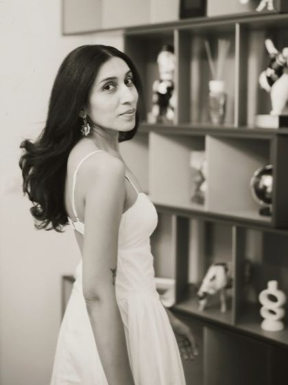 A candid portrait taken in my studio. This space is not just an office, it's a reflection of my journey and my dreams as a stylist.