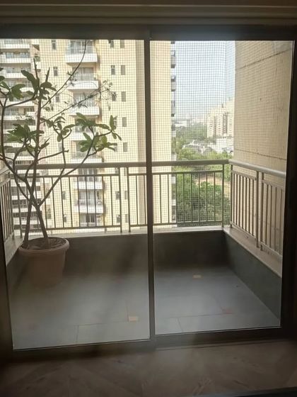 A simple and elegant sliding door for a smaller balcony.