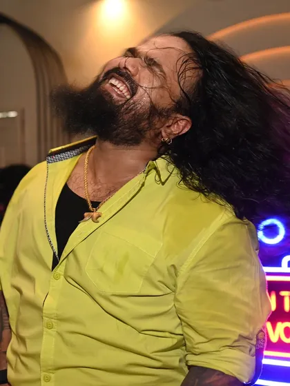 Lost in the music, hair flying, under the neon lights. This is the pure joy and release we bring to the stage, creating a perfect escape for anyone looking for a high-energy night out.