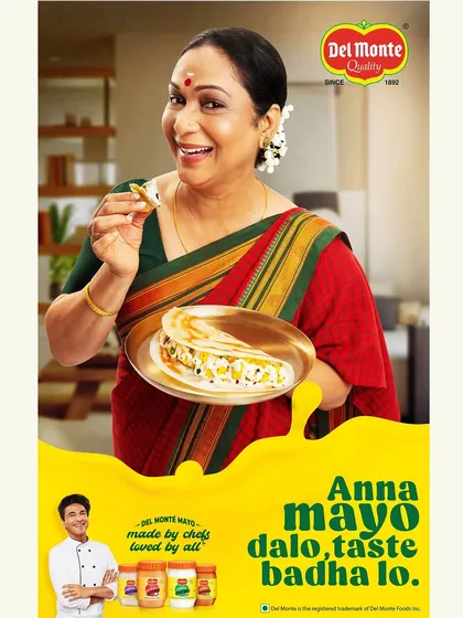 This shot for Del Monte showcases mayonnaise being used with a South Indian dosa. The image captures a joyful, authentic moment, highlighting the product's adaptability in regional cuisines with a warm, inviting feel.