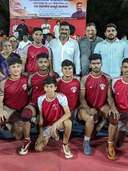 Our team posing for a photo after our victory in the friendship match.