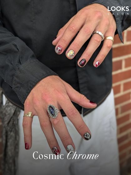 Make a statement with this Cosmic Chrome nail art. This design combines multiple colors and textures with intricate details, showcasing the high level of artistry my nail technicians can achieve for a truly unique look.
