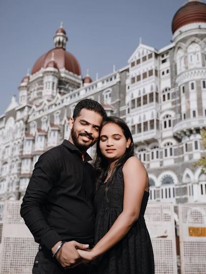 A classic portrait with the iconic Taj hotel in the background. The couple's embrace and happy expressions make this a perfect shot for any Mumbai-based love story.