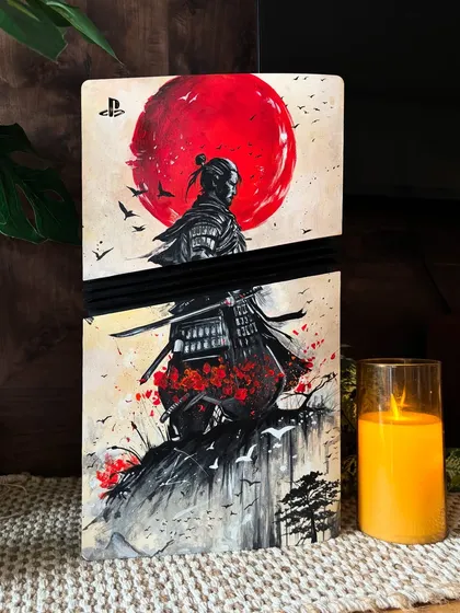 Bringing the world of 'Ghost of Tsushima' to life on a PS5 console. This was a test of patience, working with acrylics on a new surface to create depth and texture. I'm so grateful to clients who trust my vision for these big, imaginative projects.