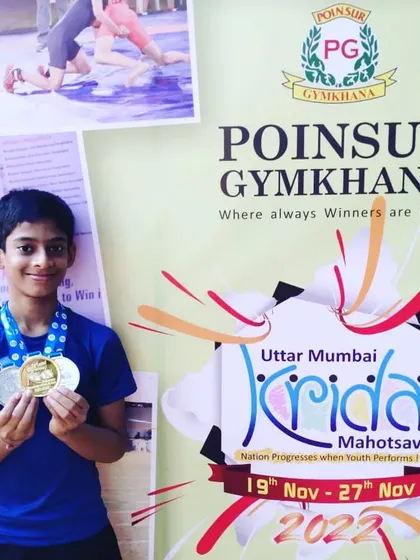 A proud Devaj Parekh showing off his gold and silver medals from the Poinsur Gymkhana Athletics Meet.