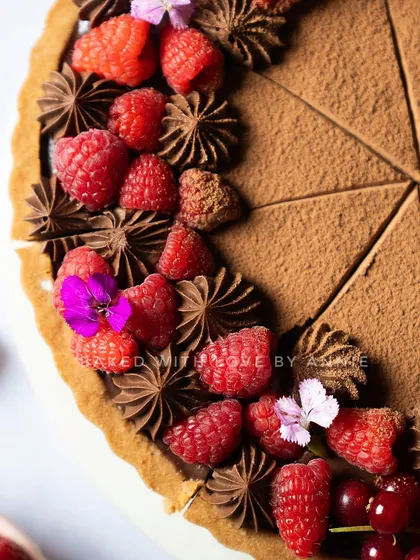 If you love a bit of freshness with your chocolate, my Raspberry Milk Chocolate Tart is for you. It has a crisp biscuit base, house-made raspberry compote, and a rich milk chocolate pudding.