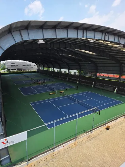 We believe that to be the best, you must train with the best. This is a glimpse of our world-class covered courts, ensuring that our young athletes have access to professional, all-weather facilities for uninterrupted, year-round tennis training.