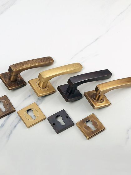 This is my Martel Lever Handle, available in both plain and hammered textures. Displayed here in four different finishes, it shows how a simple change in texture and color can transform a modern hardware design to fit any interior door or large cabinet.