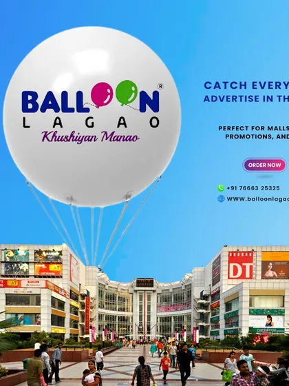 Take your brand to new heights with our giant sky advertising balloons. This graphic illustrates how a custom-branded balloon floating above a commercial area like a mall can capture widespread attention for promotions and events.