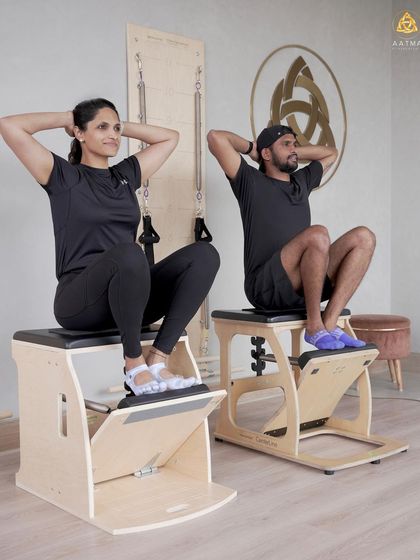 Working with a partner on the Wunda Chair adds a fun and challenging dynamic. I ensure both clients maintain proper form while they motivate each other.