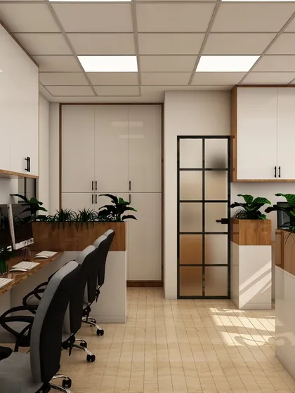 A long-shot view of the workstation aisle, emphasizing the clean, linear design and light wood flooring. This layout is designed for easy movement and efficient use of a long, narrow office space.