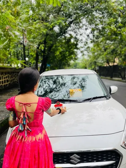 A closer look at the back of the dress made from an old saree. I added these custom tassels and a tie-up detail to give the traditional piece a playful and modern touch.