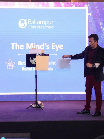 The final reveal of a prediction. The look of surprise on the volunteer's face is what makes these interactive moments so powerful and rewarding.