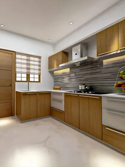 A compact L-shaped kitchen featuring a warm wood-finish laminate and white cabinets. The design includes a chimney and under-cabinet lighting for a functional cooking zone.