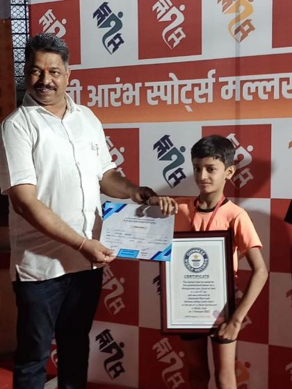 Swaransh receiving his Guinness World Record certificate on stage. This level of achievement is rare and a massive inspiration for everyone at our academy.