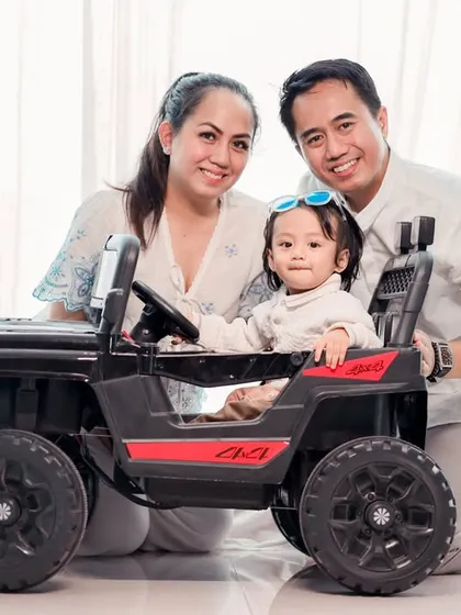We love incorporating fun props to bring out a child's personality. This little one was all smiles and ready for an adventure in our toy jeep during his baby photoshoot.