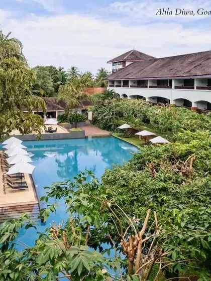 The beautiful, green surroundings of Alila Diwa, Goa. This boutique luxury resort is known for its serene atmosphere and elegant architecture.