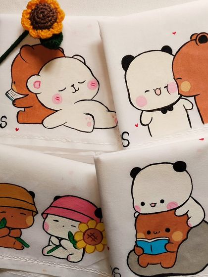 An alternative view of the four Bubu and Dudu handkerchief designs, showing the full range of cute activities.
