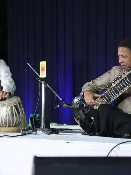A snapshot of deep concentration and musical connection while providing tabla accompaniment for the sitar maestro Ustad Shahid Parvez Khan Sahab. These are the moments on stage that I live for, where music transcends everything else.