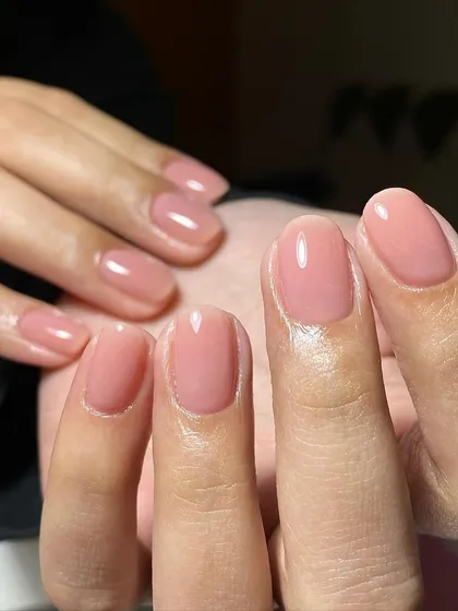 For clients who love a natural look, I offer gel overlays on natural nails. This set has a simple, clean pink gel polish for strength and shine.