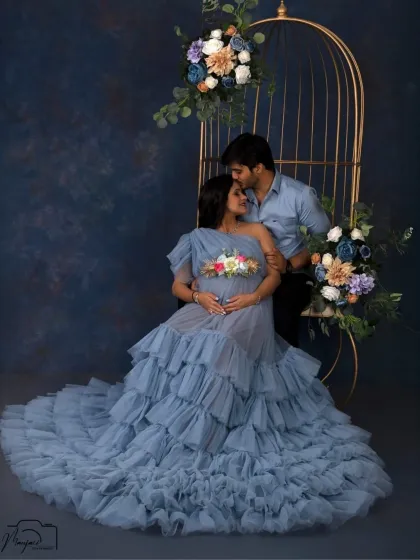 A tender kiss on the forehead is a simple yet powerful expression of love and care. This intimate moment is beautifully captured in our studio.
