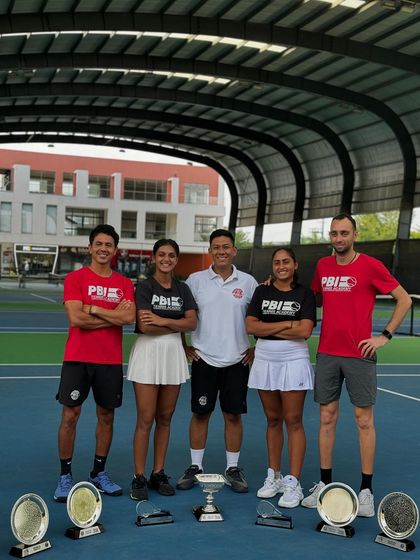 The team behind the champions. Our successful doubles pair, Akanksha and Soha, pictured with their coaches, celebrating a series of outstanding performances on the national and international stage.