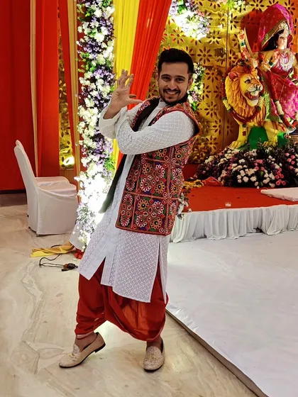 A moment of dance and devotion in front of the goddess's idol at the Rangtaali Navratri event. It's important for me to blend performance with prayer, honoring the tradition of the festival.