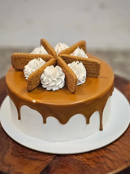 A delicious Biscoff drip cake, perfect for lovers of the popular caramelized biscuit flavor.
