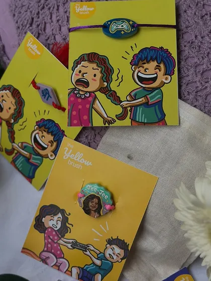 Our Rakhis are getting ready to be shipped. Each one is placed on a fun, illustrated card.