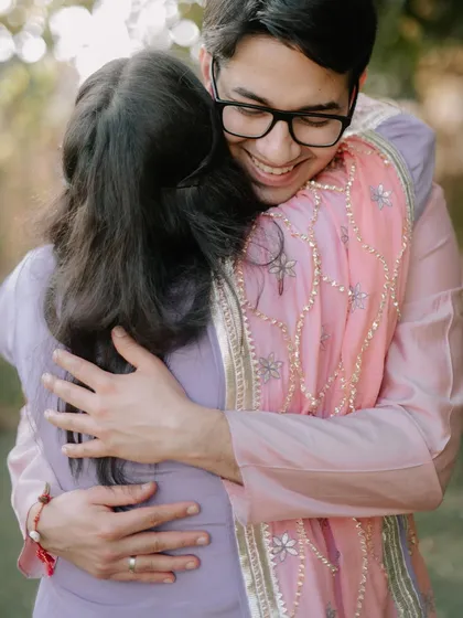 A warm, heartfelt hug between Kanika and Abhinav. Capturing these moments of pure, unscripted emotion is the essence of my photography style.