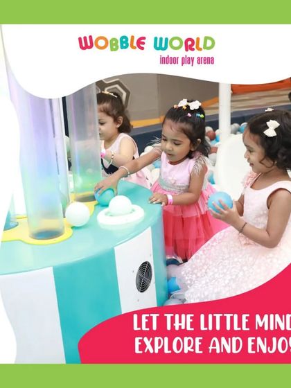 Little minds exploring one of our interactive game stations. These activities are designed to be intuitive and engaging for young children.