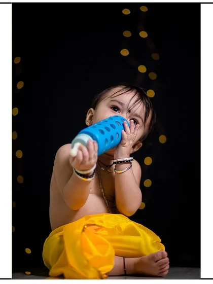 A playful moment captured in the studio. I let kids be kids, which results in authentic and charming photographs.