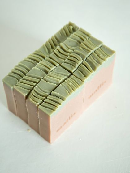 A full loaf of the Amber Musk soap, showing the beautiful textured top.