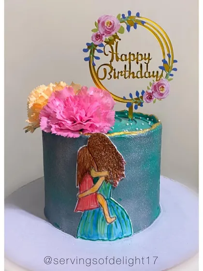 A custom hand-painted cake showing a mother and child. These personal touches are what make my cakes so special and meaningful.