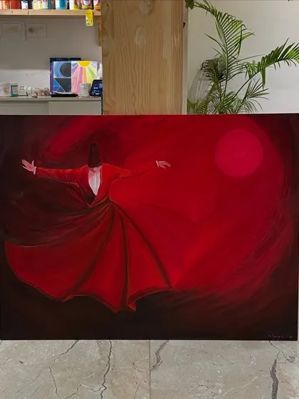 A breathtaking painting of a whirling dervish, created by one of our talented members. The vibrant red and sense of motion capture the passion and energy we love to see in our studio.