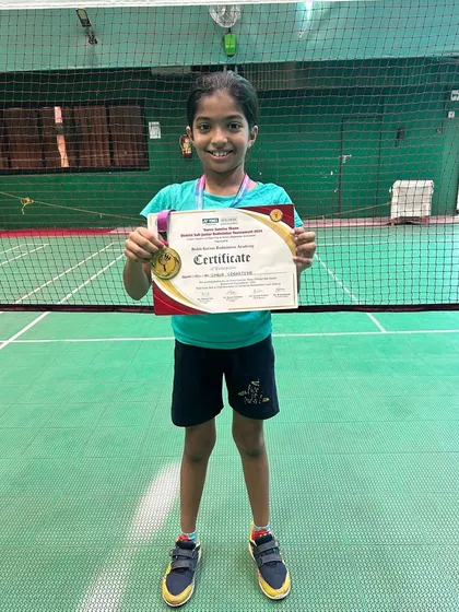 Smaya Venkatesh, another one of our talented students, proudly holding her certificate after a strong performance at the Thane District tournament.