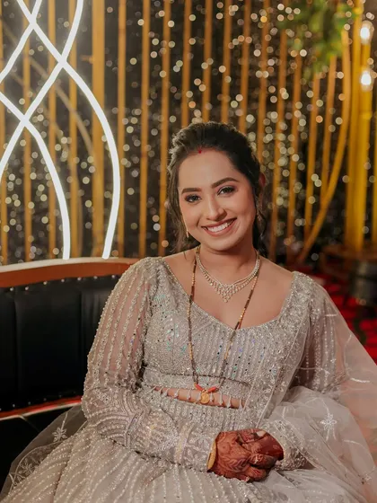 A beautiful, smiling close-up of the bride.
