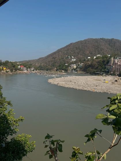 A view of the Ganga from a cafe in Rishikesh. Her gushing water sings songs of reassurance, and her presence encourages deep self-reflection.