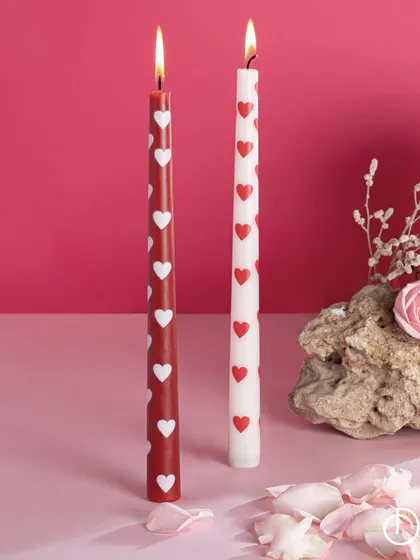 Add a dash of sheer elegance to your date-night candlelight dinners with my Taper candles. Printed with hearts and infused with our Opulent Oud fragrance, they spark the flame that brought you two together.