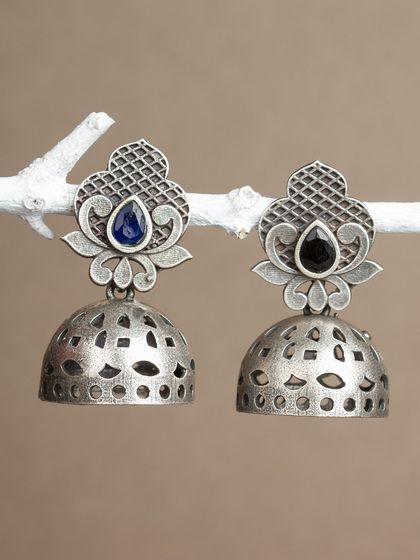 Another look at our popular cut-out dome jhumkas in oxidized silver. They are lightweight and have a beautiful, intricate design.