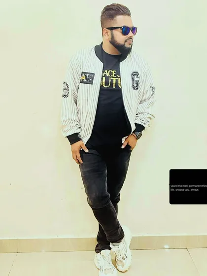 Your attitude isn't just your outlook, it's your signature. A full-length style shot against a clean background, showcasing a confident look.