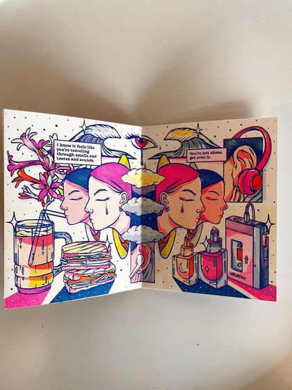 An open spread of the zine, showcasing the interplay of personal and universal symbols of nostalgia.